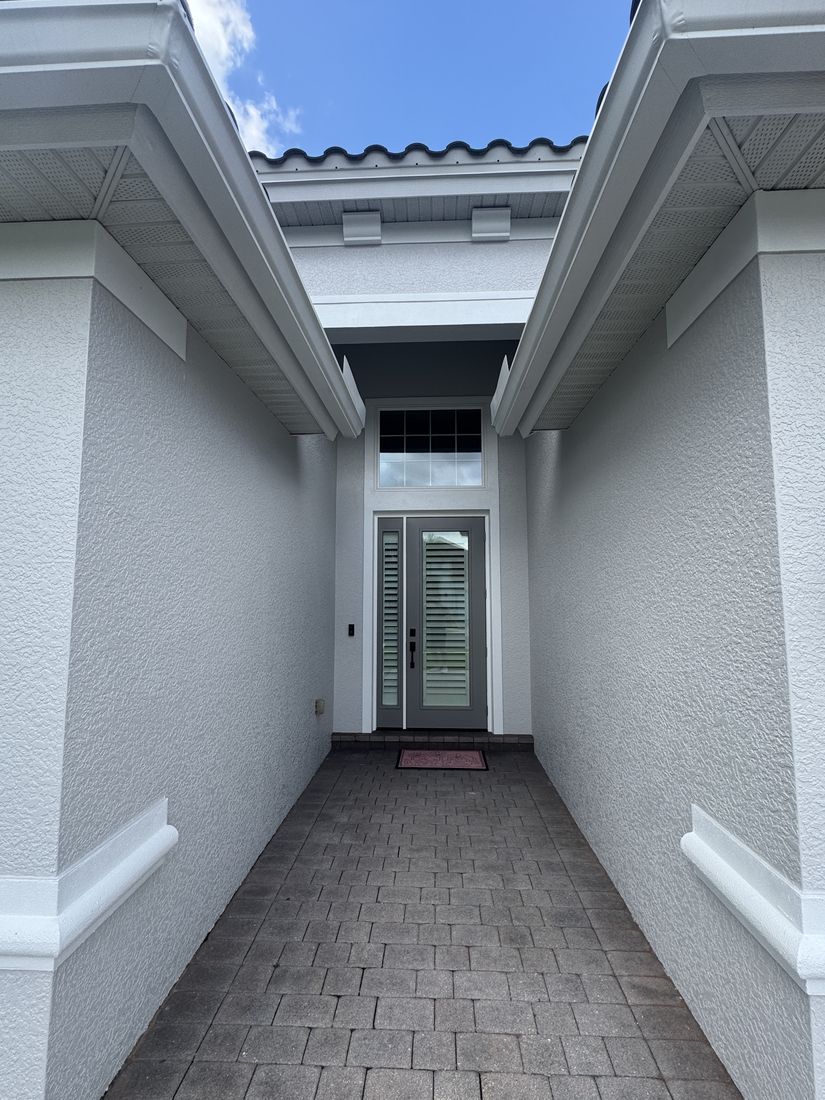 Before and after exterior repaint of a Bonita Springs home